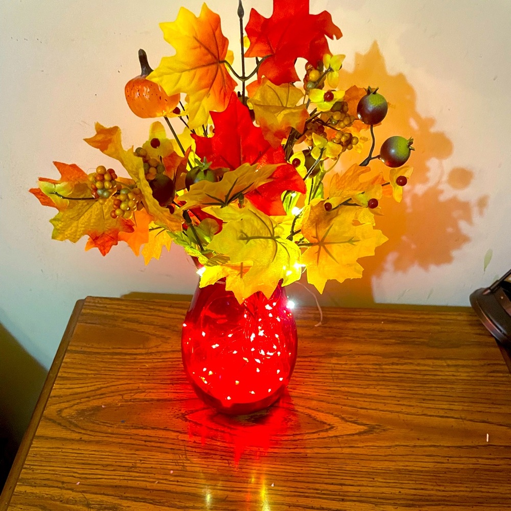 Autumn Leaf Arrangement in Red Vase